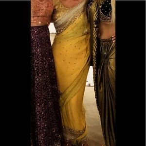 Genuine Saree with sleeveless top and also comes with skirt for underneath